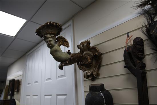 A pair of 19th century Italian carved and painted parcel gilt wall scones, 20in.